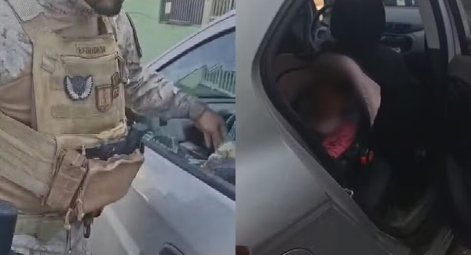 Policiais penais precisaram quebrar vidro de carro para socorrer bebê de 10 meses que ficou presa acidentalmente, em Trindade — Foto: Reprodução/TV Anhanguera